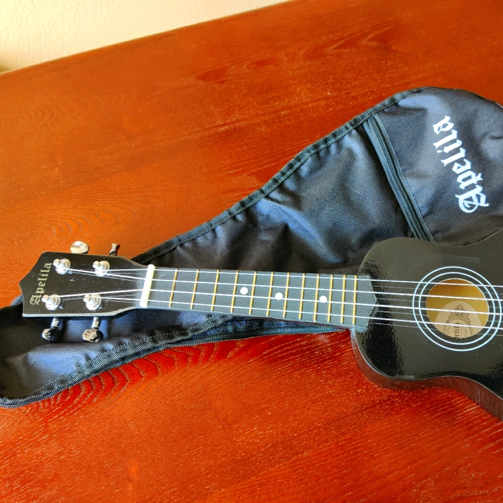 Apelila toy ukelele with carrying bag